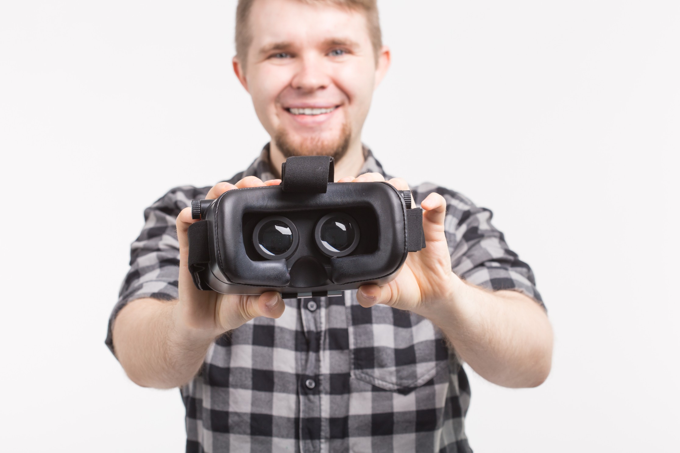 Instructor helps student put on a VR headset